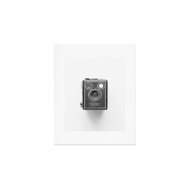 A Kodak Brownie analog vintage camera on a white background  Retro photography in black and white Art Print Gallery Image 1