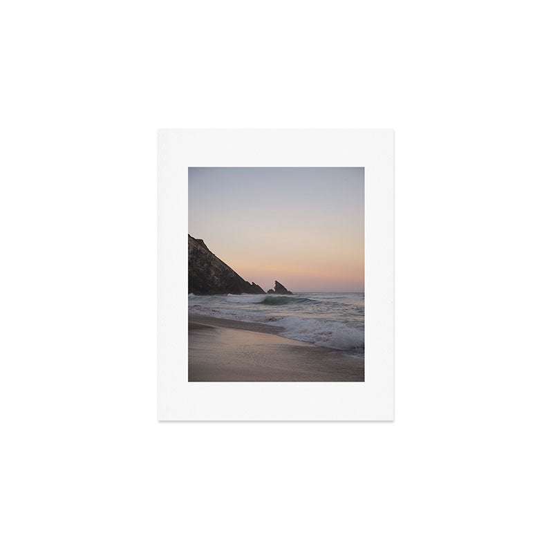 Pastel orange sunrise at Praia da Adraga in Portugal - summer coastal travel photography Art Print Gallery Image 1