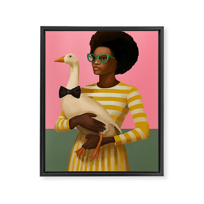 Stylish Woman Holding Goose in Striped Dress Framed Canvas Print Gallery Image 1
