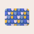 Rows of Tulips in Bloom in Blue & Mustard Yellow Bath Mat Gallery Image 1