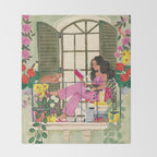 Woman reading on balcony Throw Blanket Gallery Image 2