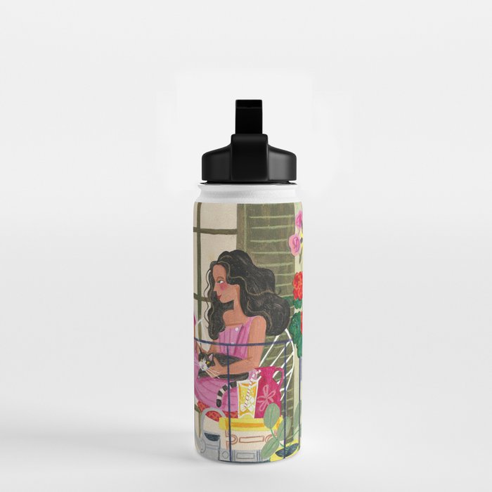 Woman reading on balcony Water Bottle Gallery Image 2
