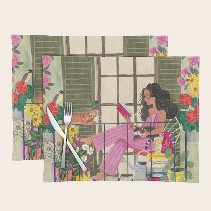 Woman reading on balcony Placemat Gallery Image 1