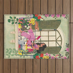 Woman reading on balcony Outdoor Rug Gallery Image 1