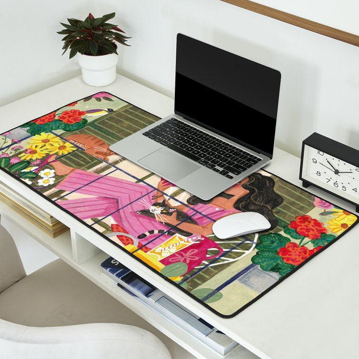 Woman reading on balcony Desk Mat Gallery Image 2