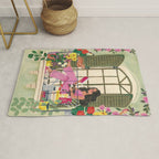 Woman reading on balcony Rug Gallery Image 1