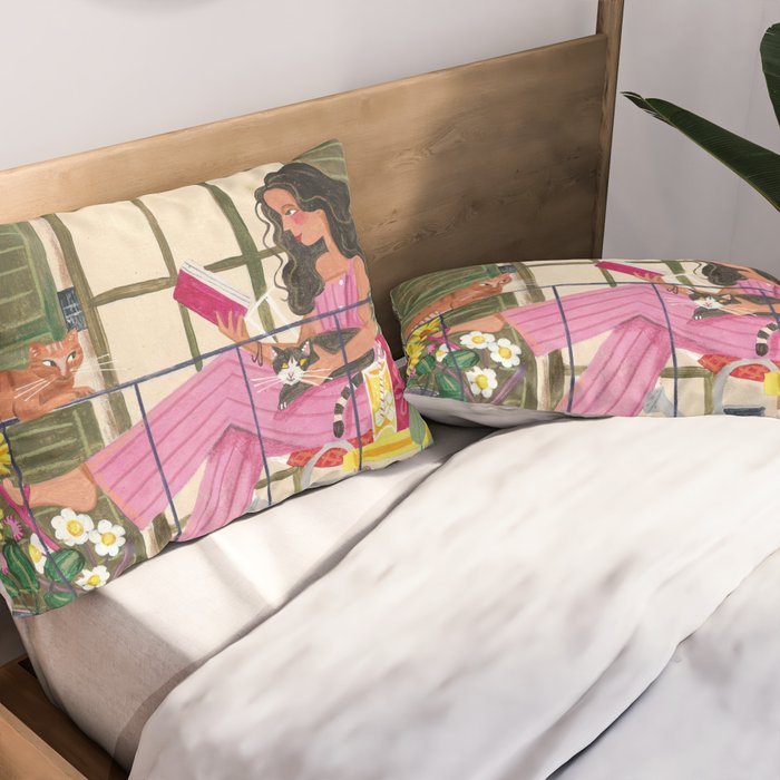 Woman reading on balcony Pillow Sham Gallery Image 2