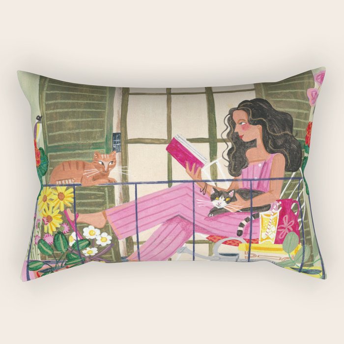 Woman reading on balcony Rectangular Pillow Gallery Image 2