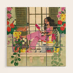 Woman reading on balcony Wood Wall Art Gallery Image 1
