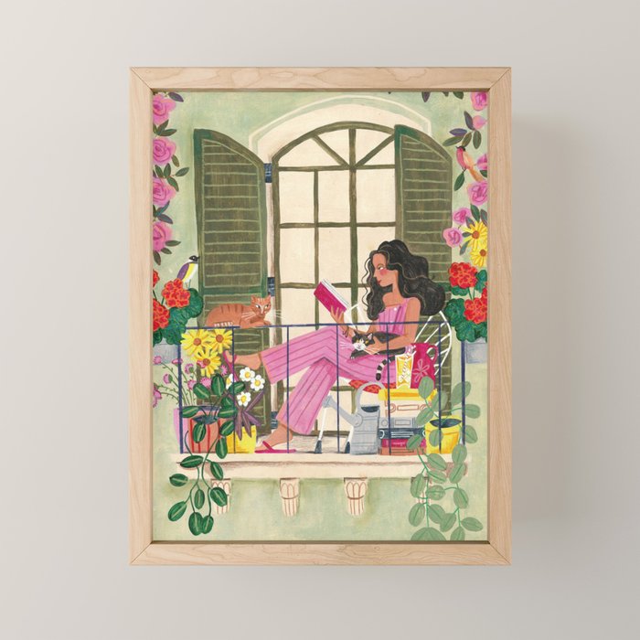Woman reading on balcony Mini Art Print Gallery Image 1