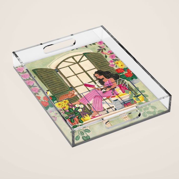 Woman reading on balcony Acrylic Tray Gallery Image 1