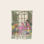 Woman reading on balcony Wall Hanging Gallery Image 1