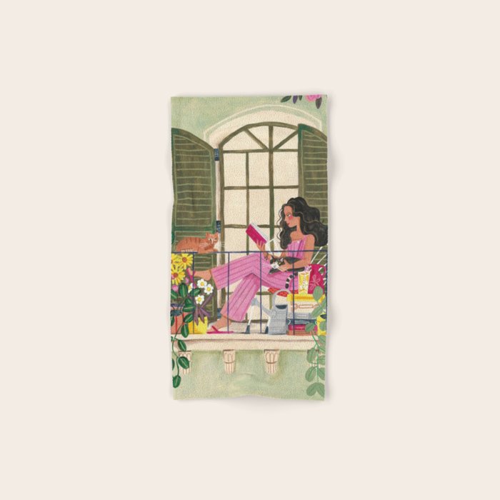 Woman reading on balcony Bath Towel Gallery Image 1