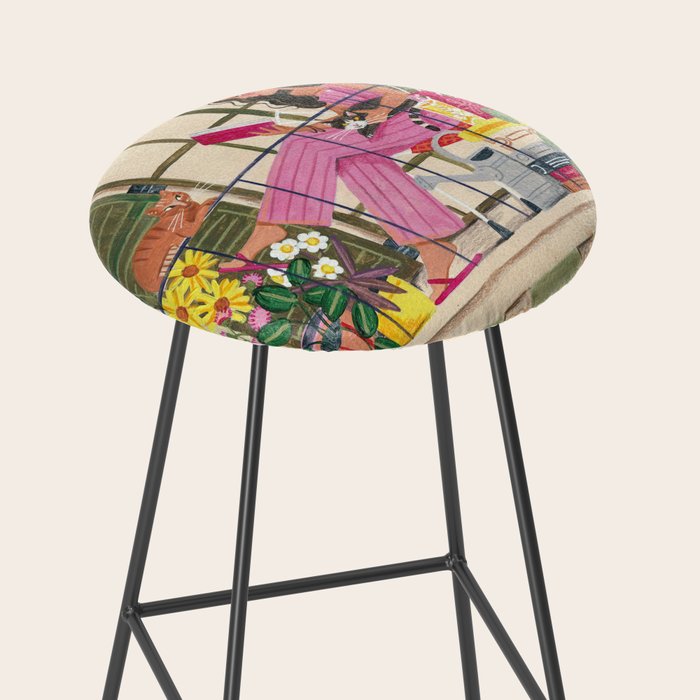 Woman reading on balcony Stool Gallery Image 2