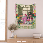 Woman reading on balcony Wall Tapestry Gallery Image 2
