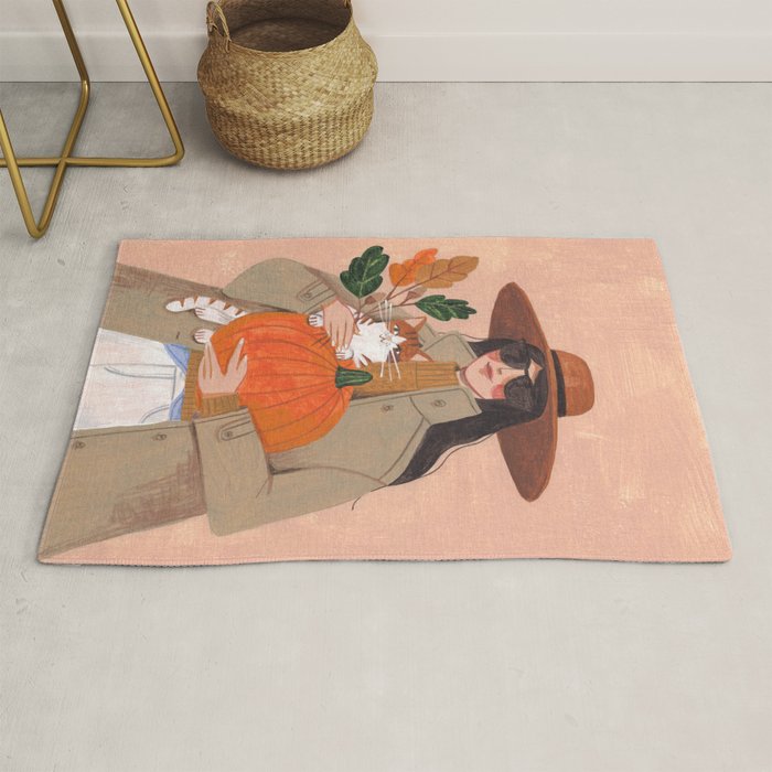 Woman in autumn in warm earth tones Rug Gallery Image 1