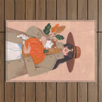 Woman in autumn in warm earth tones Outdoor Rug Gallery Image 1