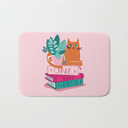 One more chapter // pastel pink background orange tabby cat striped mug with plants fuchsia pink and green books  Bath Mat Gallery Image 1