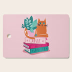 One more chapter // pastel pink background orange tabby cat striped mug with plants fuchsia pink and green books  Cutting Board Gallery Image 1