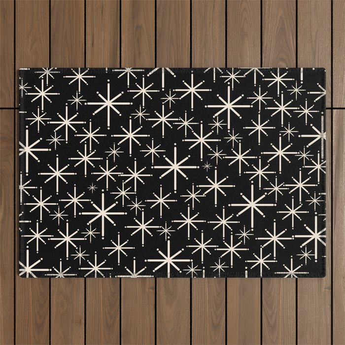 Twinkling Mid Century Modern Starburst Pattern Black and Cream Outdoor Rug Gallery Image 1