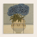 bouquet of lush blue hydrangeas in a vase on a blue background Wood Wall Art Gallery Image 1