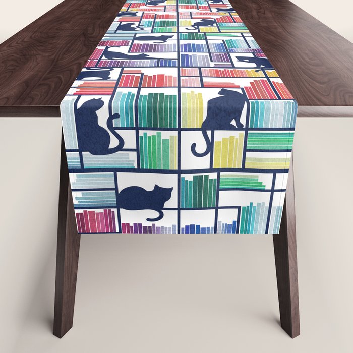 Rainbow bookshelf // white background navy blue shelf and library cats Table Runner Gallery Image 1