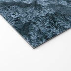 Man lying in the snow on a frozen lake in a winter forest - Landscape Photography Welcome Mat Gallery Image 2