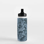 Man lying in the snow on a frozen lake in a winter forest - Landscape Photography Water Bottle Gallery Image 2