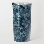 Man lying in the snow on a frozen lake in a winter forest - Landscape Photography Travel Mug Gallery Image 3