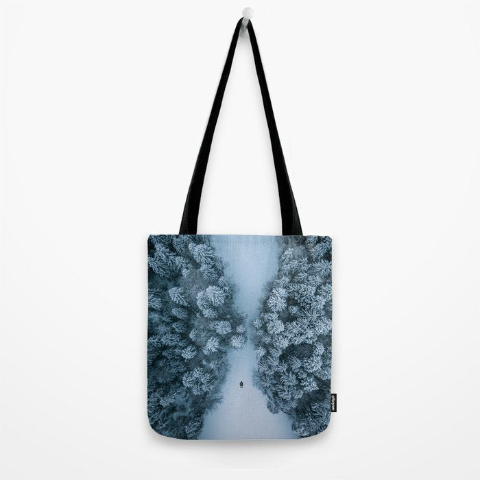 Man lying in the snow on a frozen lake in a winter forest - Landscape Photography Tote Bag Gallery Image 2