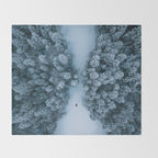 Man lying in the snow on a frozen lake in a winter forest - Landscape Photography Throw Blanket Gallery Image 2