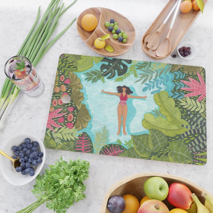 Floating in the sea in bright colours Cutting Board Gallery Image 2