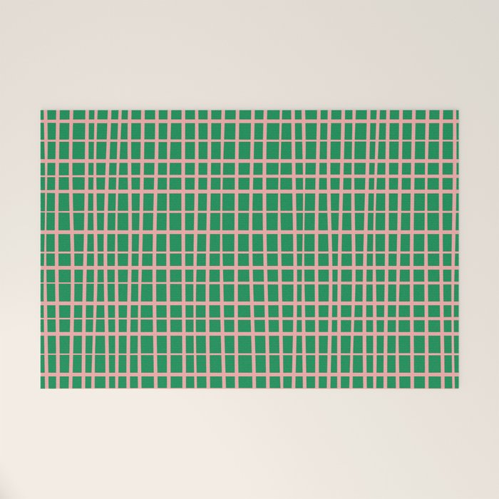 Irregular Grid Pattern in Green and Pink Welcome Mat Gallery Image 1