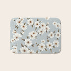 seamless pattern with daisies on a blue background Bath Mat Gallery Image 1