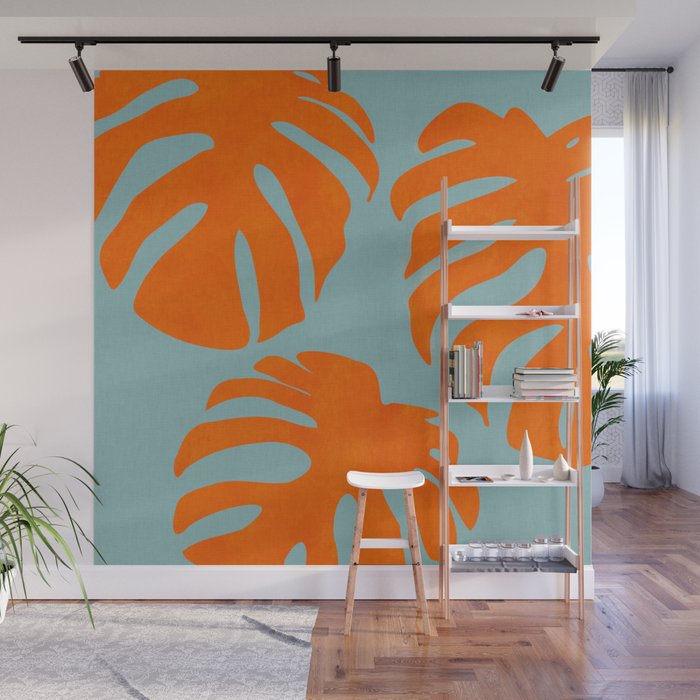 monstera leaves blue orange plant summer Wall Mural Gallery Image 1