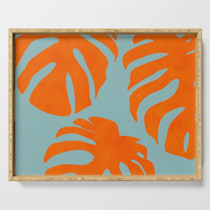 monstera leaves blue orange plant summer Serving Tray Gallery Image 1