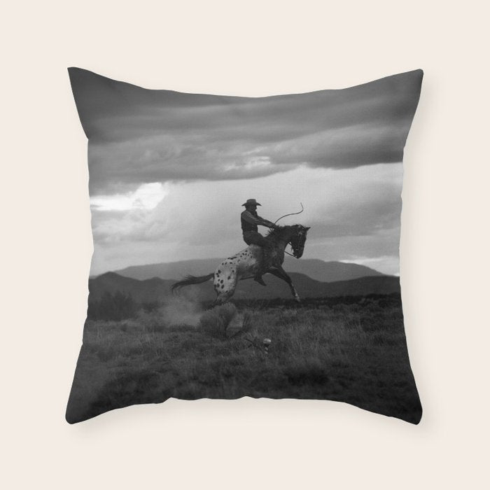 Black and White Cowboy Being Bucked Off Throw Pillow Gallery Image 1