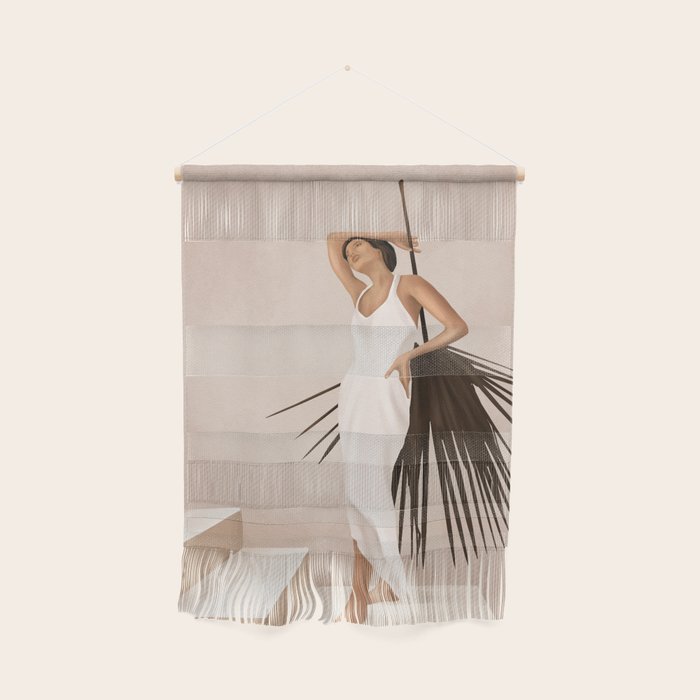 Minimal Woman with a Palm Leaf Wall Hanging Gallery Image 1