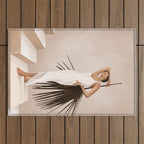 Minimal Woman with a Palm Leaf Outdoor Rug Gallery Image 1