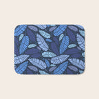 Tropical palm leaves pattern in blue Bath Mat Gallery Image 1