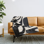Retro Liquid Swirl Abstract in Black and Almond Cream 2 Throw Blanket Gallery Image 1