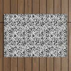 Numbers pattern in black and white Outdoor Rug Gallery Image 1