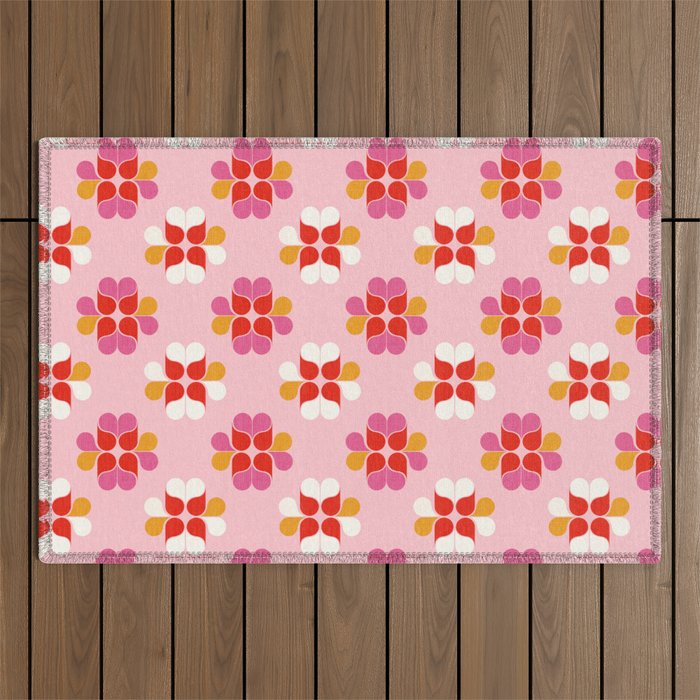 Retro Floral Pattern in Pink, Red, and Orange Outdoor Rug Gallery Image 1