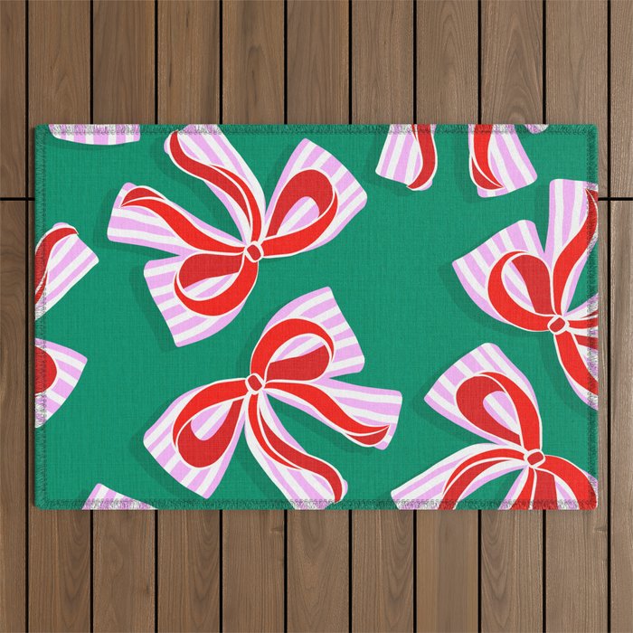 Retro Kitsch Christmas Ribbons on Stripy Bows - Red and Green Outdoor Rug Gallery Image 1