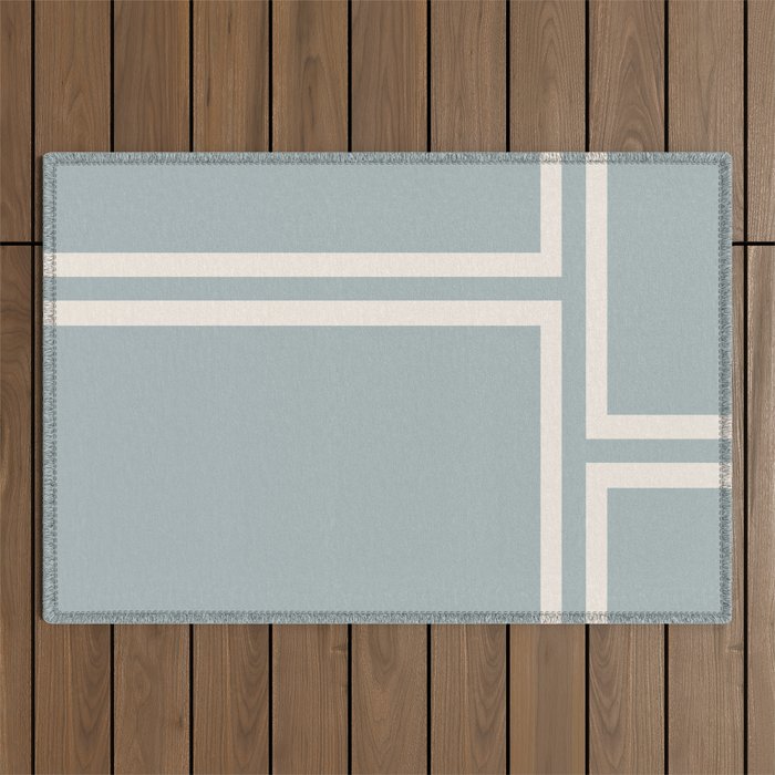 Soft Deco Minimalist Pattern in Light Blue-Gray and Cream Outdoor Rug Gallery Image 1