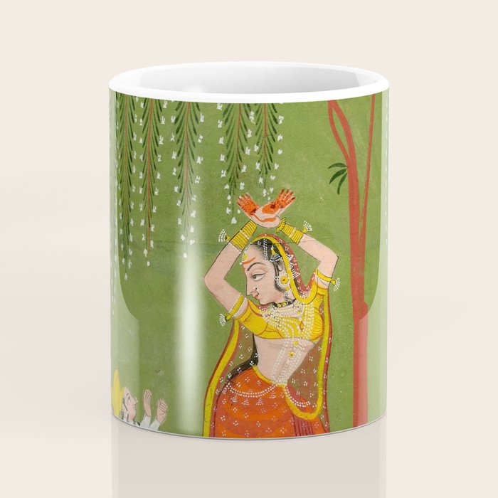 A female attendant is standing in tribhanga pose under a tree. A small child vies for her attention. Coffee Mug Gallery Image 4