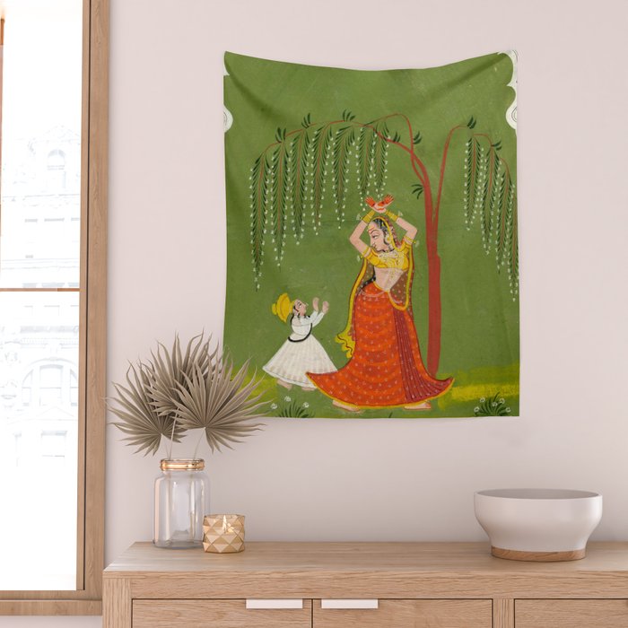 A female attendant is standing in tribhanga pose under a tree. A small child vies for her attention. Wall Tapestry Gallery Image 2