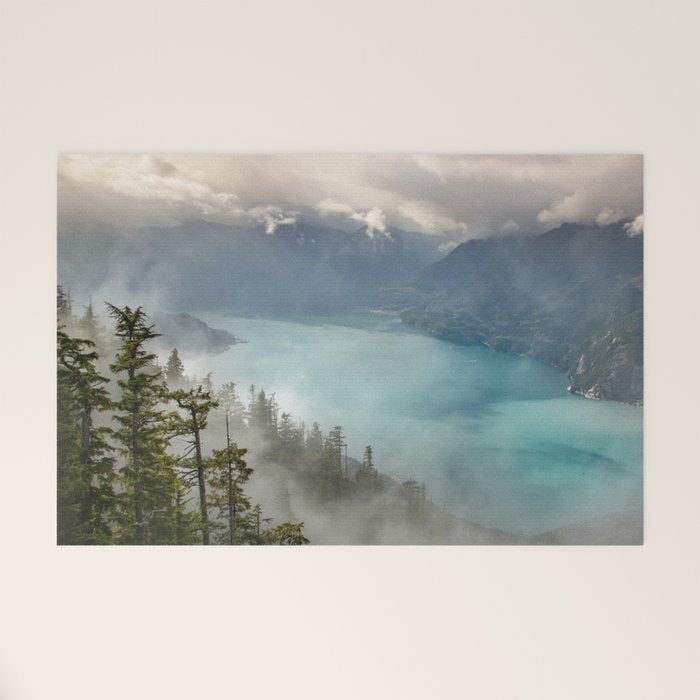 Morning sunshine over the clear mountain blue lake Welcome Mat Gallery Image 1