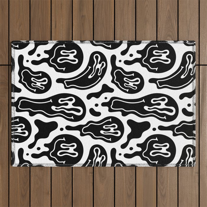Black and white melted happy face pattern Outdoor Rug Gallery Image 1