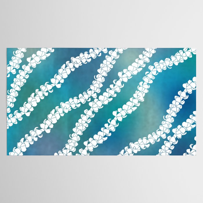 Puakenikeni single lei art on blue Tablecloth Gallery Image 2